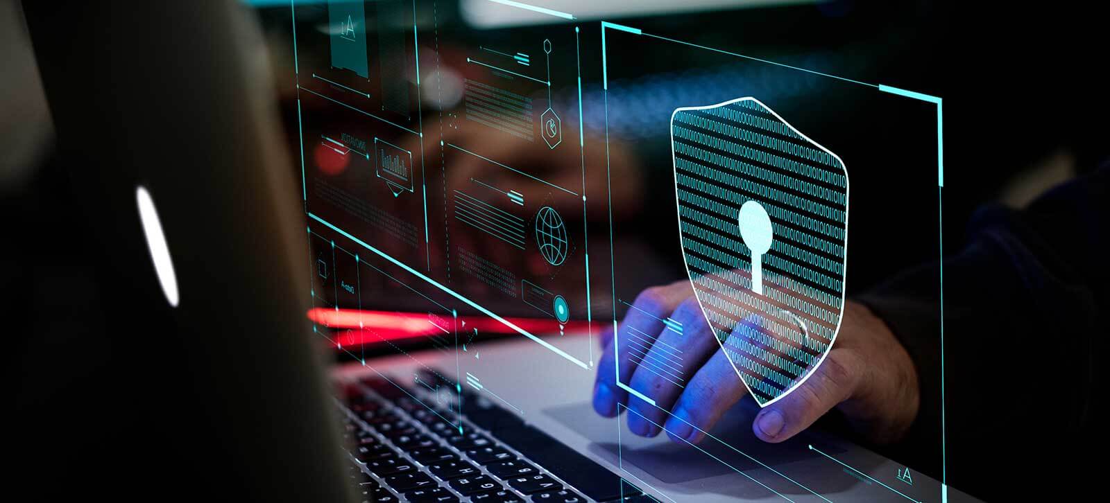 Close up of hands typing on a computer keyboard with a digital visual of a lock