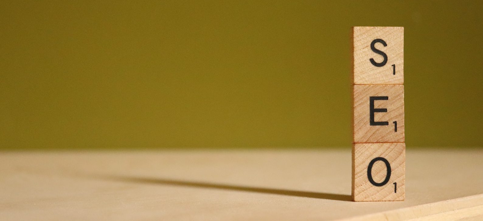 wooden blocks stacked that spell SEO