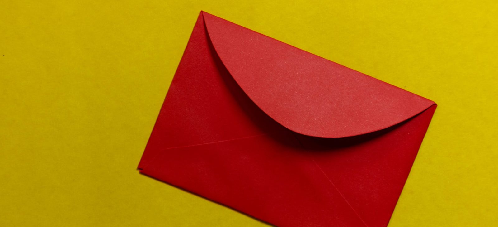 red paper on yellow surface